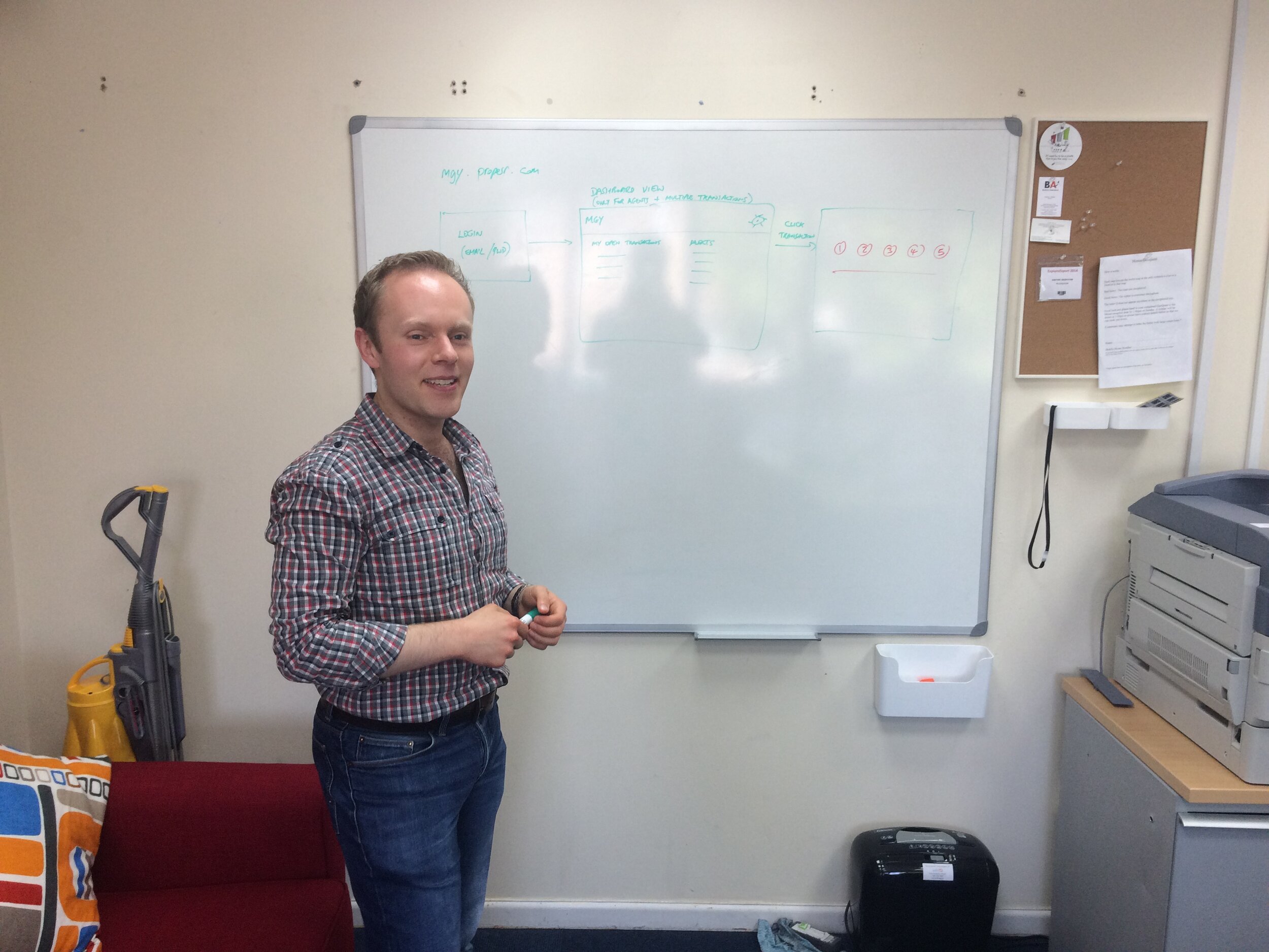 Photo of Steve Talbot in front of a marker board